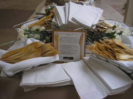 A table with many white napkins and some crackers