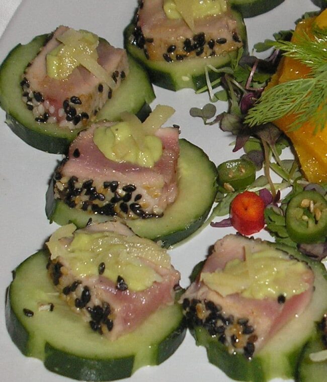 ahioncucumber A plate of food with tuna and cucumber.