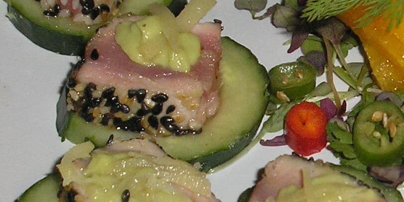 ahioncucumber A plate of food with tuna and cucumber.