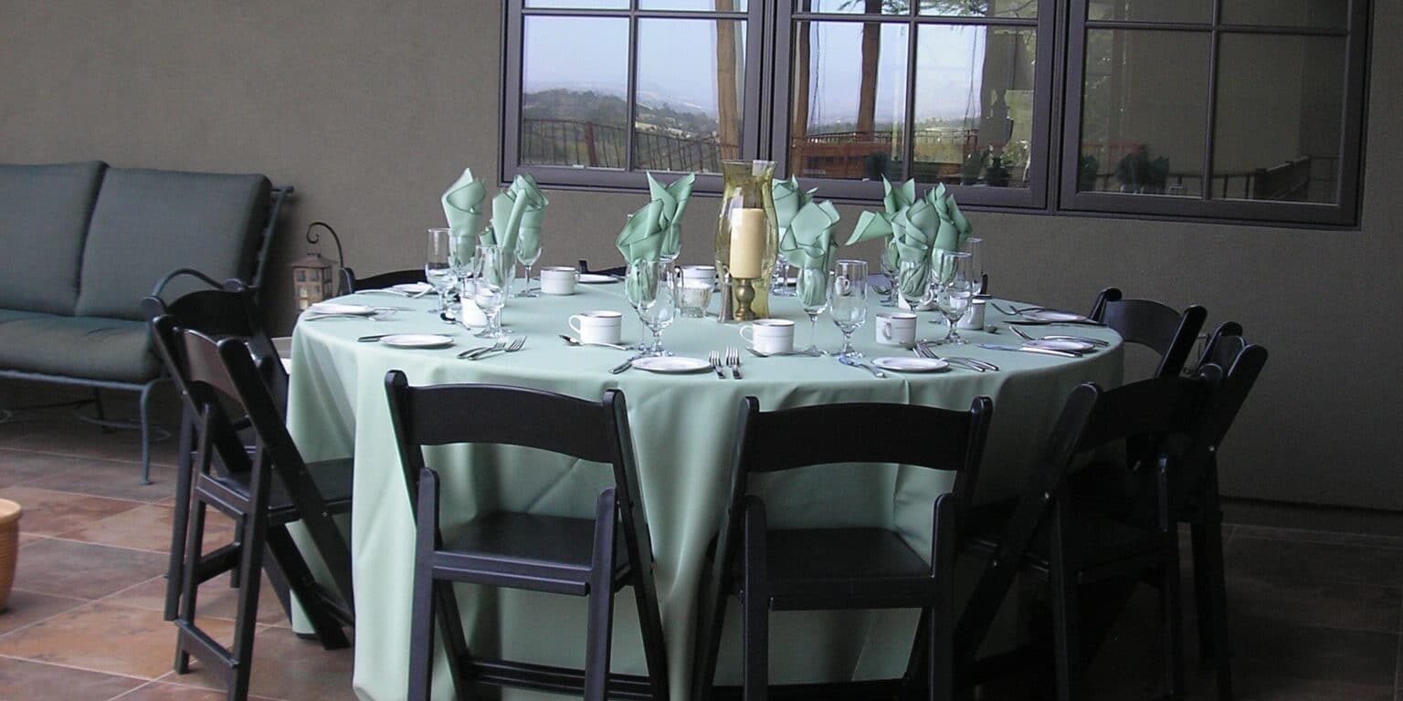 dinner-party-private-residence-2 A table set with plates and glasses on top of it.