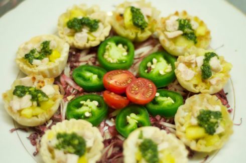 A plate of food with vegetables on it.