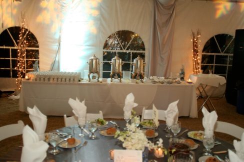 A table with many plates and silverware on it