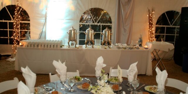 winter-wonderland-for-800-coffee-display-2 A table with many plates and silverware on it